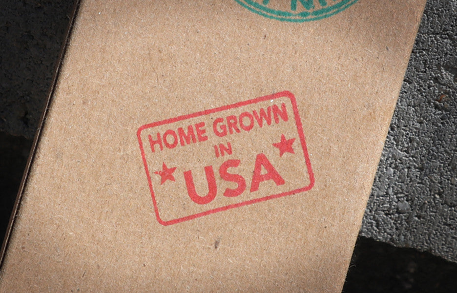 "Home Grown in USA" ink stamp on back of Skinny Pete's Three Piece Gourmet catnip gift set package.
